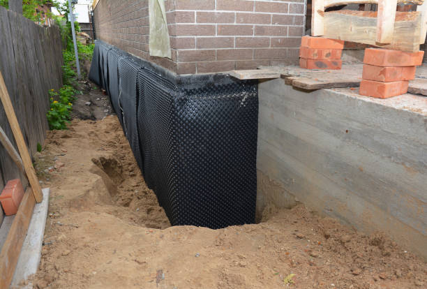 Happy homeowners after waterproofing job in Perry Park